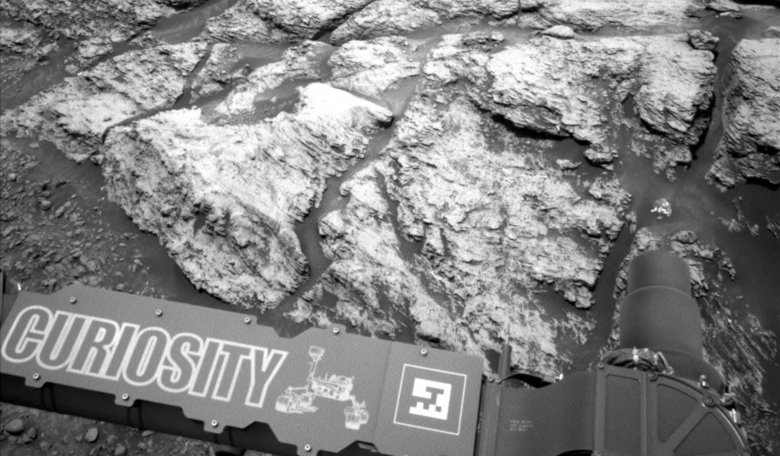 This image was taken by the left Navcam on NASA's Curiosity Mars rover on 18 June, 2019, the 2,440th Martian day, or sol, of the mission. It shows part of 