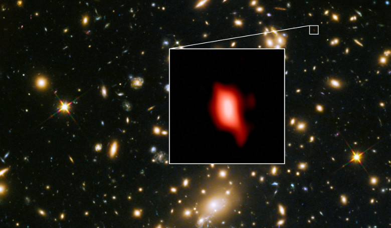 This image shows the galaxy cluster MACS J1149.5+2223; the inset image is the distant galaxy MACS1149-JD1, with the oxygen distribution depicted in red. Image: ALMA, NASA/ESA HST, W. Zheng (JHU), M.Postman (STScI), the CLASH Team, Hashimoto et al.