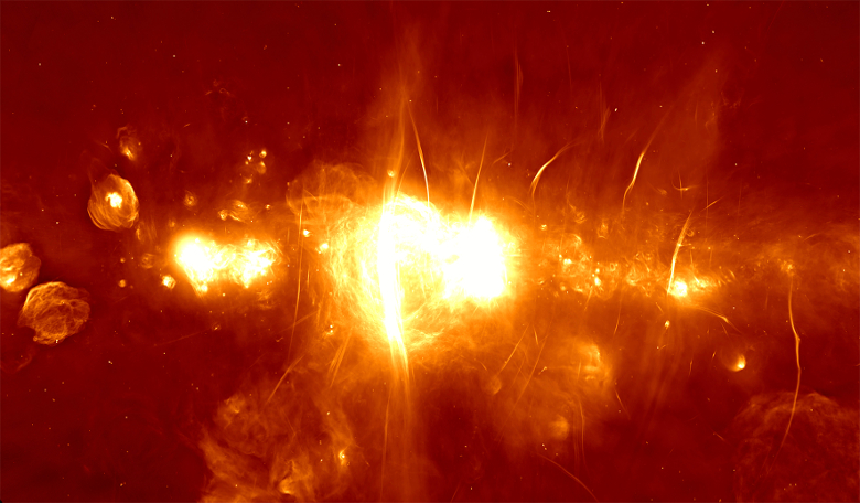 The MeerKAT image shows shows the central regions of our galaxy. The colour scheme represents the brightness of the radio waves recorded by the telescope (ranging from red for faint emission to orange to yellow to white for the brightest) Image: SARAO