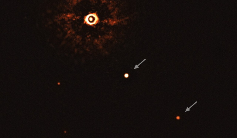 This image, captured by the SPHERE instrument on ESO’s Very Large Telescope, shows the star TYC 8998-760-1 accompanied by two giant exoplanets, TYC 8998-760-1b and TYC 8998-760-1c. Image: ESO/Bohn et al.