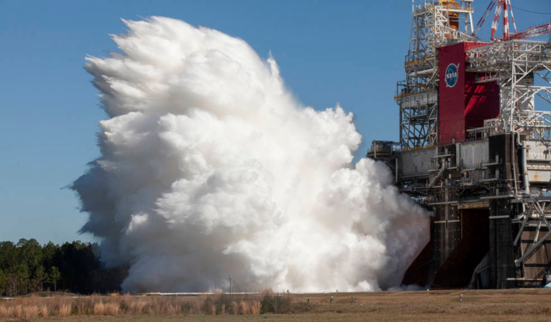 The core stage for the first flight of NASA’s SLS rocket is seen in the B-2 Test Stand during a second hot fire test, 18 March, 2021, at NASA’s Stennis Space Center near Bay St. Louis, Mississippi. Image: NASA/Robert Markowitz