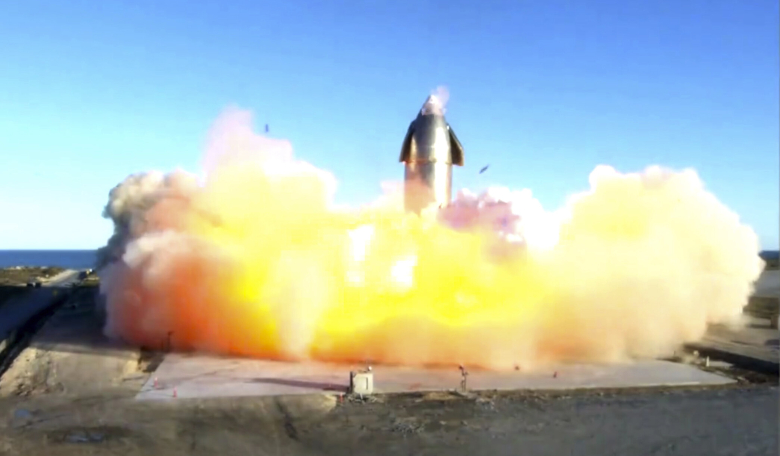 In this image taken from a video posted by SpaceX, the company's Starship becomes engulfed in flames and ruptures upon touching down after a test flight, Wednesday, 9 Dec, 2020, in a remote area of Texas. Image: SpaceX via AP