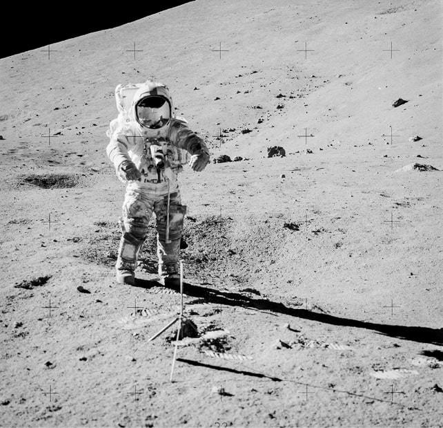 Apollo 17 astronaut Gene Cernan preparing to collect samples 73001 and 73002.