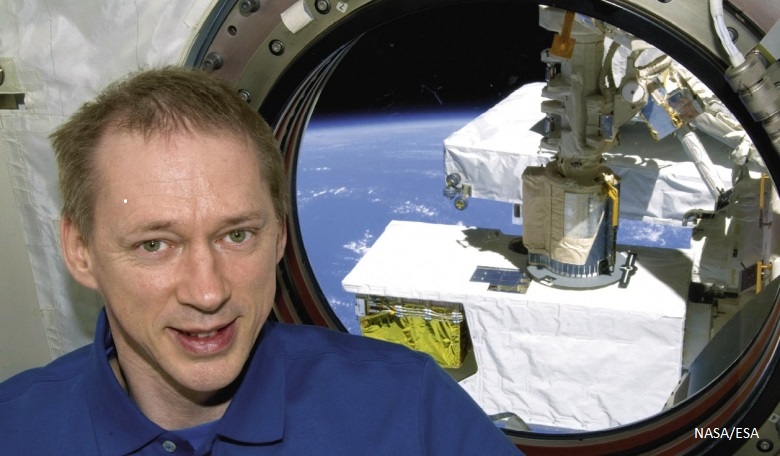   Frank De Winne poses for a photo near a window in the Japanese Kibo laboratory during his ISS mission as Expedition 20 flight engineer.