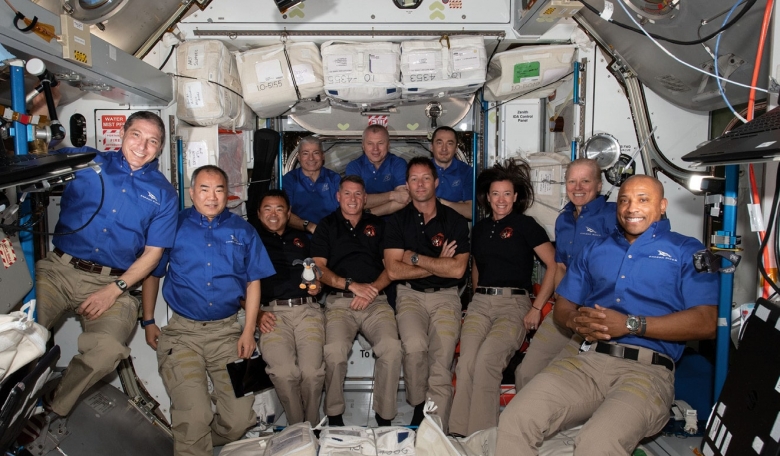 Eleven crew members aboard the International Space Station in April 2021. Back row (from left): NASA astronaut Mark Vande Hei and Roscosmos cosmonauts Oleg Novitskiy and Pyotr Dubrov. Centre: Akihiko Hoshide (JAXA), Shane Kimbrough (NASA), Thomas Pesquet (ESA) and Megan McArthur (NASA). Far left and right corners: Michael Hopkins (NASA), Soichi Noguchi (JAXA), and Shannon Walker and Victor Glover (both NASA).