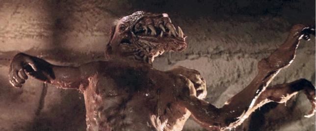 A film still from The Thing showing the alien creature in one of its forms.