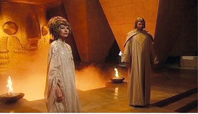 Queen Atsil and Atraxon in the hall of the Atlantean city of Vaar (right) from the film Warlords of Atlantis.